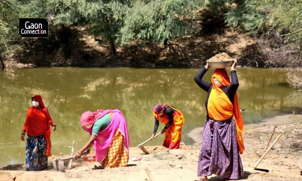 Poor rural women works under harsh daylight