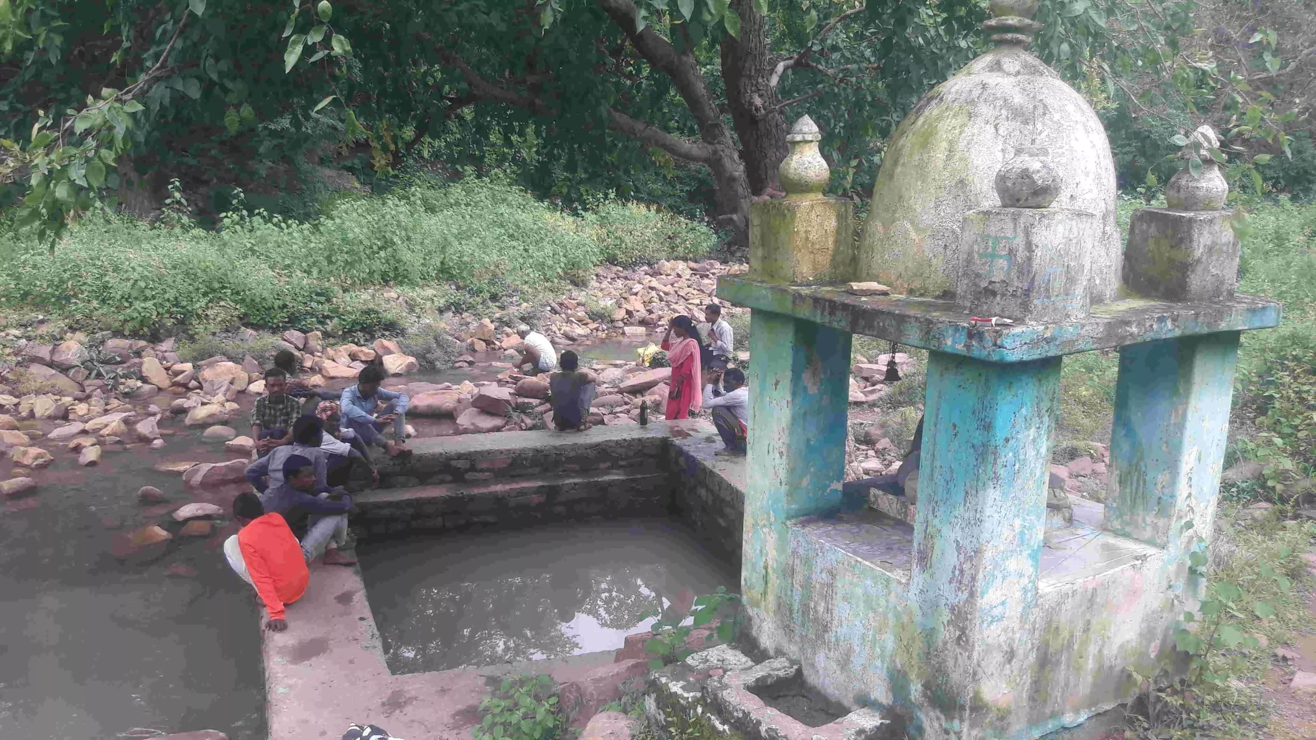 The jhiriya is the sole drinking water source of these villagers.