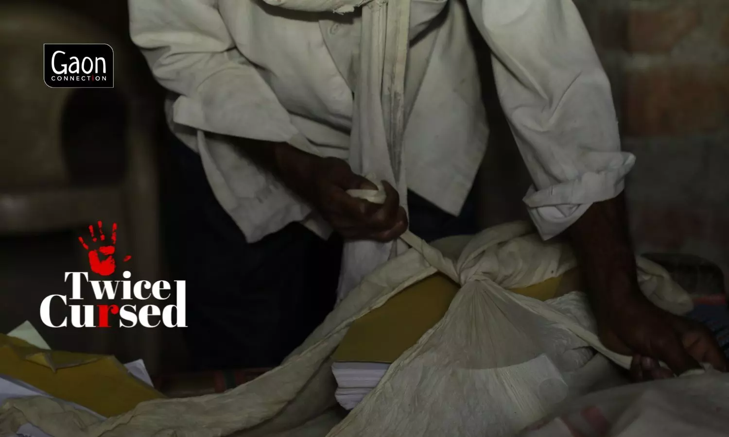 Sohan Lal carefully tying legal documents in an old cloth. It is has been eights years since he has been fighting to get justice for the dead daughters.