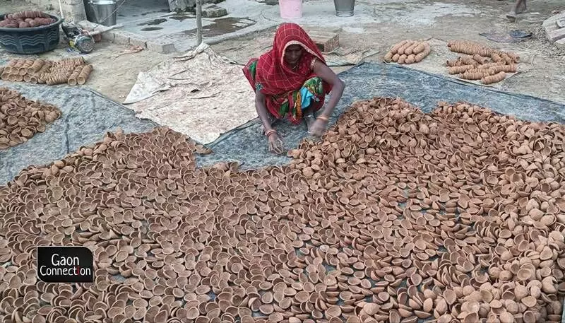 In some households, diya-making is something that only the women-folk  are engaged with.