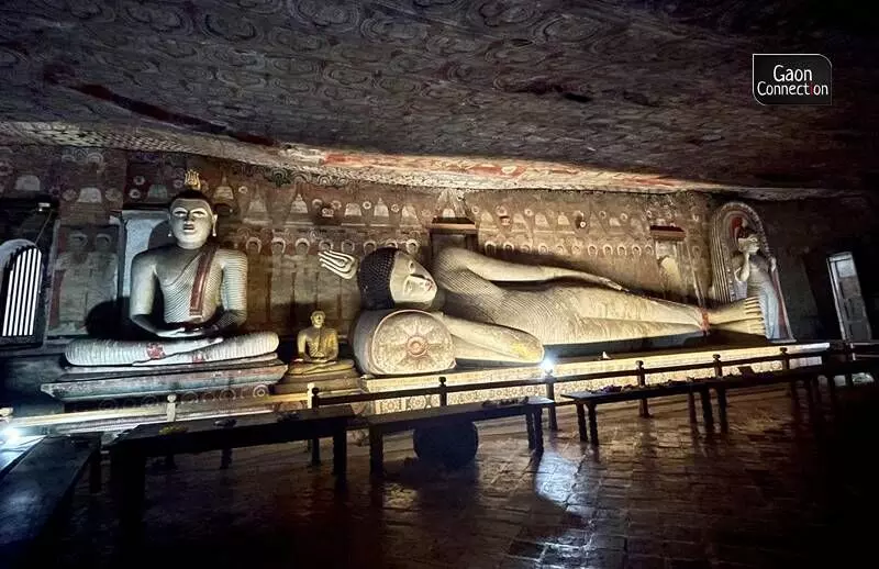 The 45 feet long idol of sleeping Buddha almost seems too large for the cave.