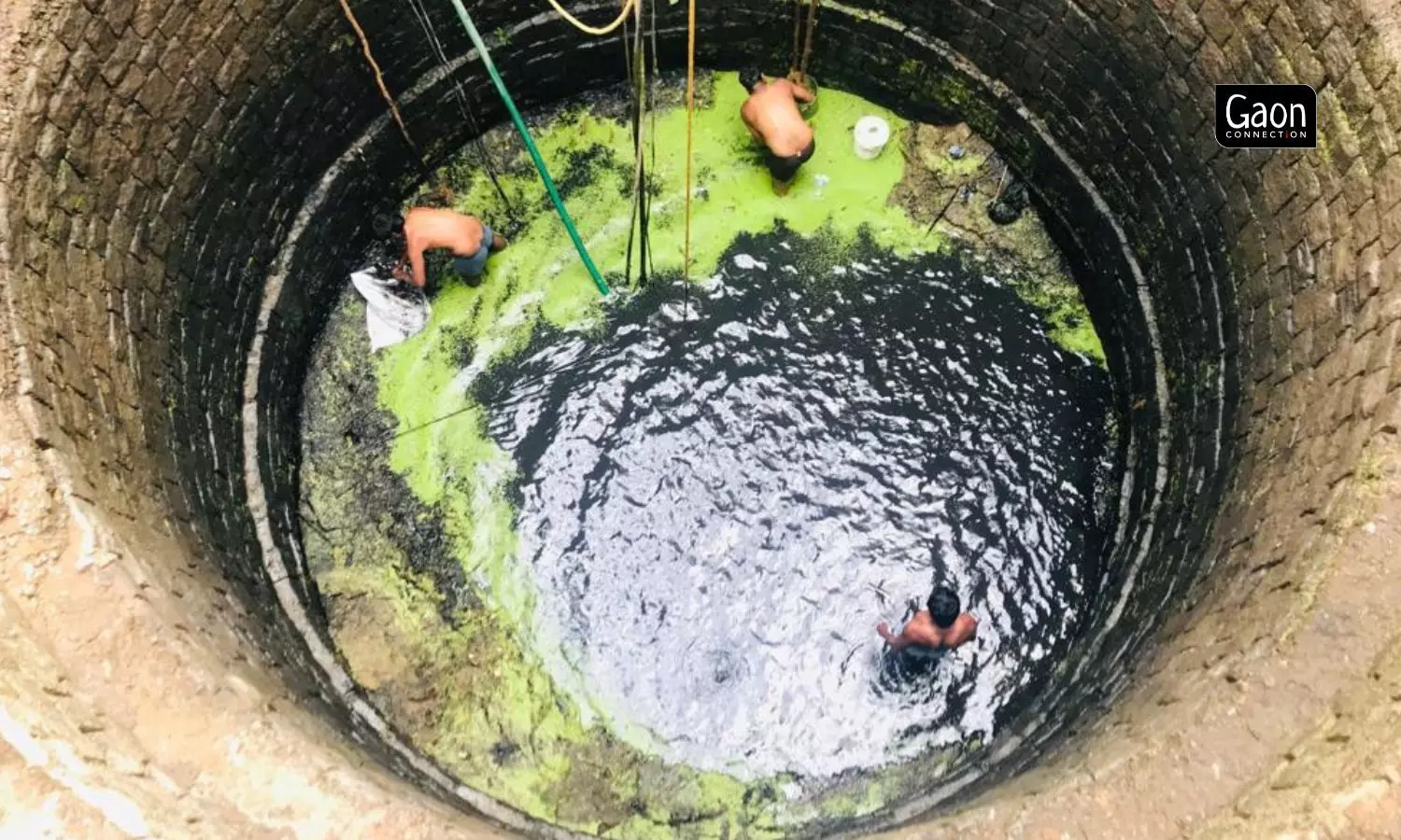 Well-warriors stood inside the 60-feet deep well, in their undergarments, removing silt and waste from the giant well, which once was the sole source of water for the washermans community at the dhobi ghat.