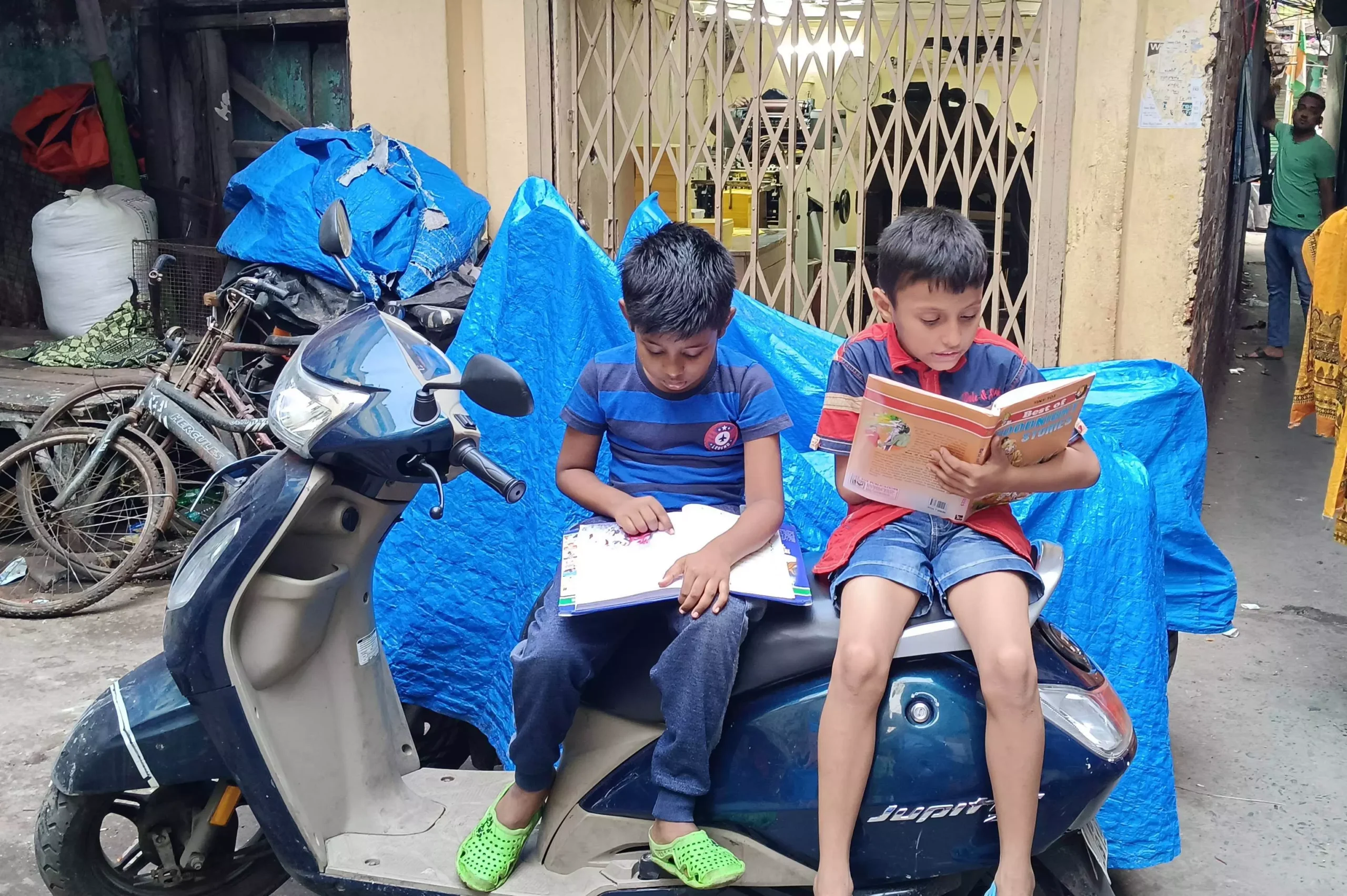 Despite the chaos in the streets, the students dont lose focus from studying.