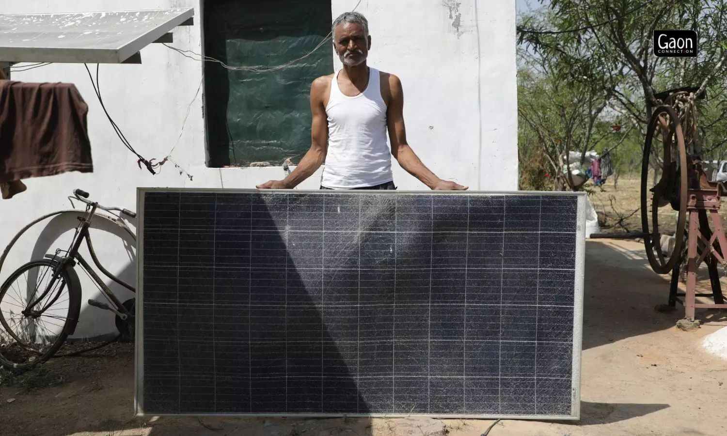 Bhagat Singh Rajput in Chhikahra village, Mahoba, shows the damaged solar plate due to climatic wrath, which hasnt been replaced. 