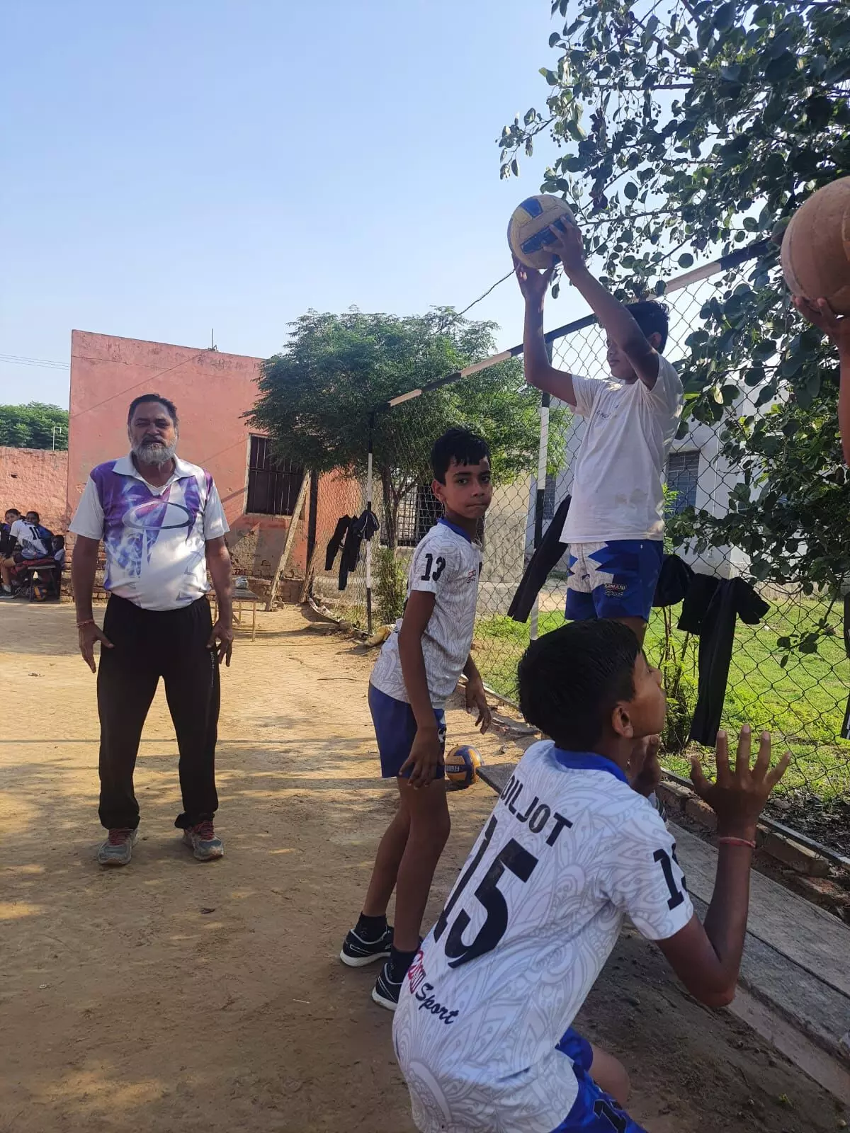 Though he retired in 2014, Basant Singh Mann continues to coach children from the school and from nearby villages at the school grounds in Silwala Khurd. 
