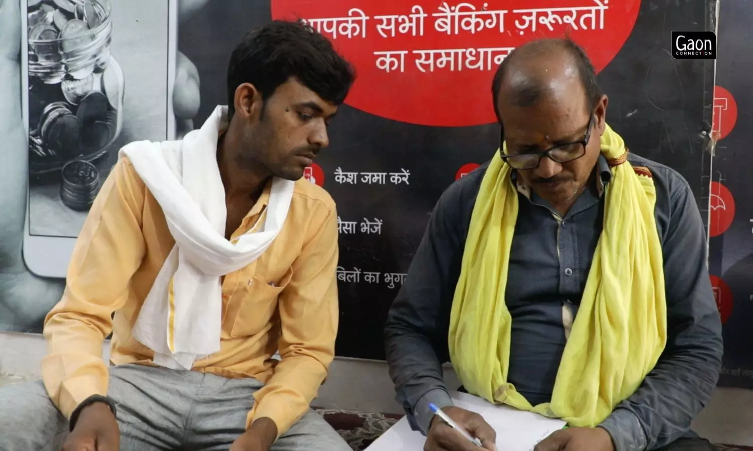 Swami Prasad in Lamora village of Mahoba, Uttar pradesh runs a Jan Suvidha Kendra and helps the farmers with the paperwork to avail a solar irrigation pump.