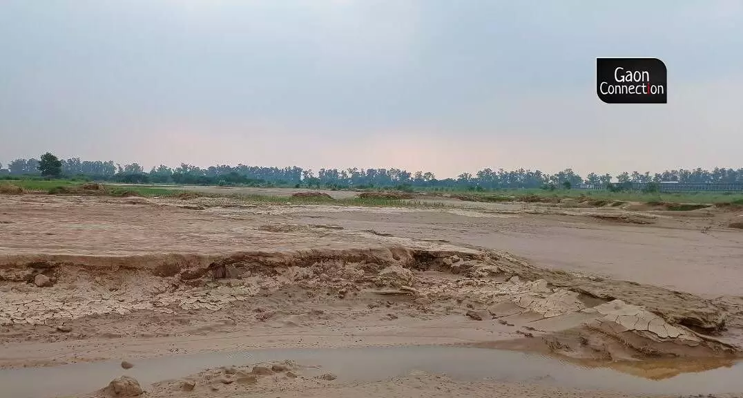 The excess rainfall caused the Tangri river to be in spate to an extent that it split into two streams near the Jatwar village in Haryana’s Ambala district and engulfed areas which had never witnessed the flow of river water for decades.