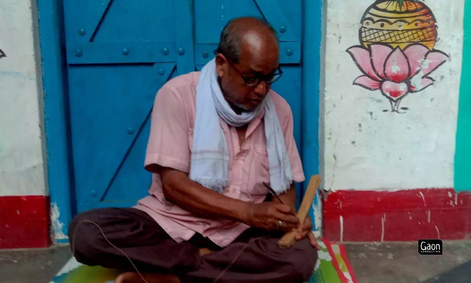 An iron stylus called lekhani that is prepared by the village blacksmiths.